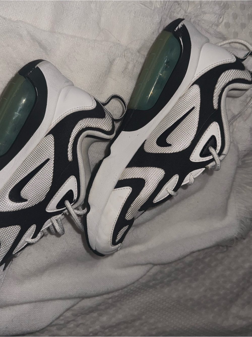 Nike White and Black Athletic Sneakers with Visible Air Cushion